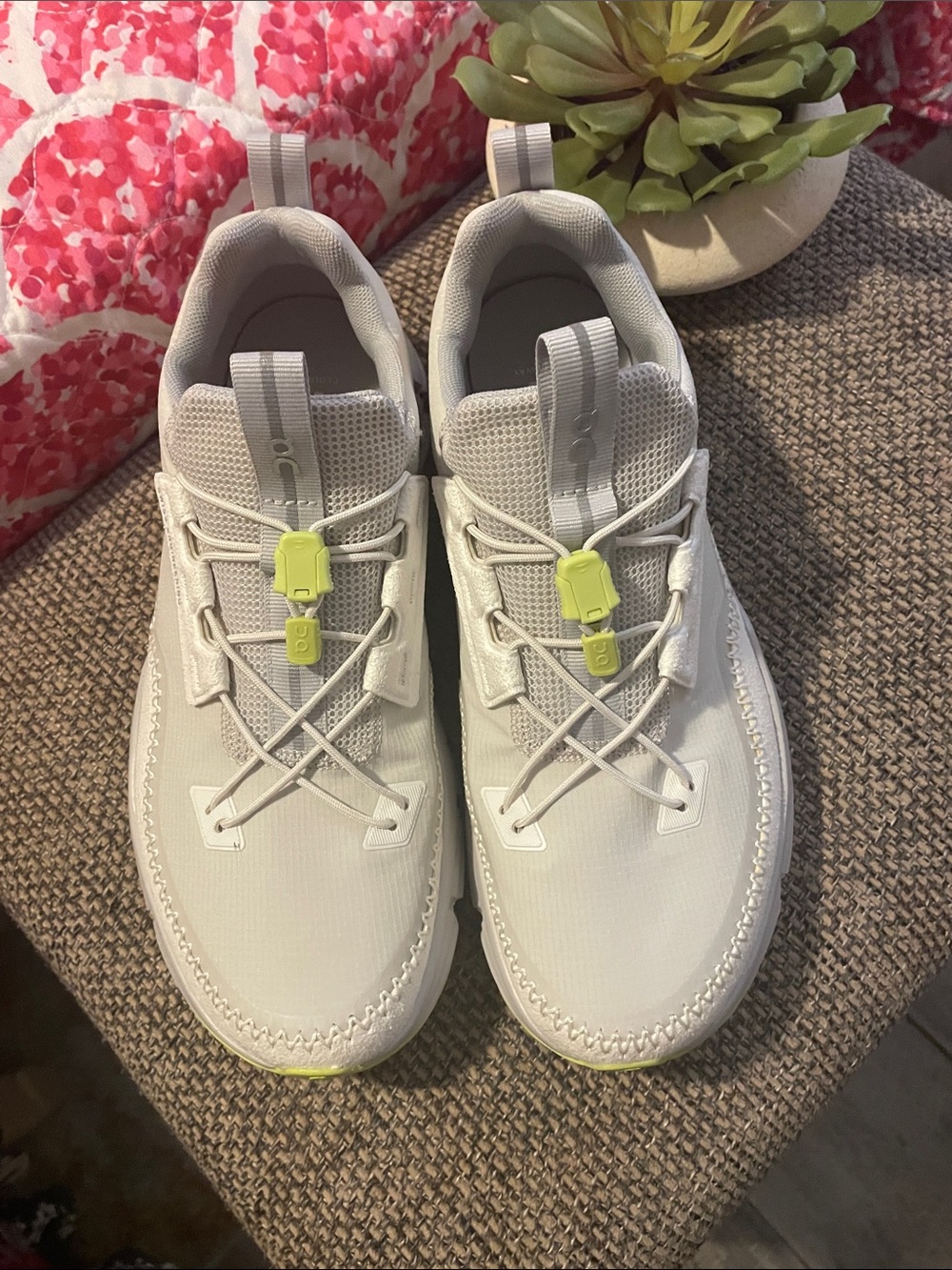 On Running White and Grey Sneakers with Neon Yellow Accents